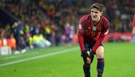 Spain's midfielder #09 Gavi reacts to injuring his knee during the UEFA Euro 2024 group A qualifying football match between Spain and Georgia at the Jose Zorrilla stadium in Valladolid on November 19, 2023. Photo by CESAR MANSO / AFP