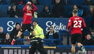 Manchester United's Argentinian midfielder #17 Alejandro Garnacho celebrates scoring his team first goal during the English Premier League football match between Everton and Manchester United at Goodison Park in Liverpool, north west England on November 26, 2023. (Photo by Paul ELLIS / AFP)