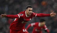Liverpool's English defender #66 Trent Alexander-Arnold celebrates after scoring their fourth goal during the English Premier League football match between Liverpool and Fulham at Anfield in Liverpool, northwest England, on December 3, 2023. (Photo by Paul ELLIS / AFP)