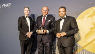 QIB Group CEO Bassel Gamal receiving the award by The Banker Magazine.