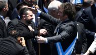 Argentina's new president Javier Milei (right) is greeted by Ukraine's President Volodymyr zelensky after delivering his inaugural speech before the crowd during an inauguration ceremony at the Congress in Buenos Aires on December 10, 2023. (Photo by Luis Robayo / AFP)