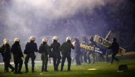File: Panathinaikos' fans clash with riots police after the cancellation of the Greek Super League match between Panathinaikos and Olympiakos at Apostolos Nikolaides stadium in Athens on November 21, 2015. ( AFP)