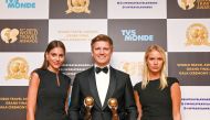 Raffles Doha officials receiving the awards at the World Travel Awards for 2023.