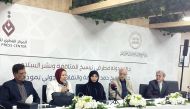 Spokesperson of Sheikh Hamad Award for Translation and International Understanding Dr. Hanan Al Fayyad (centre) with winners of the award during an event at Qatar Press Center yesterday.