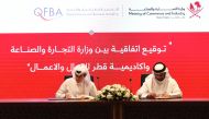 MoCI Director of the Human Resources Department Abdullah bin Ali Al Khowaiter and QFBA Director of Training and Development Majed bin Abdulaziz AlKhulaifi during the agreement signing.