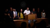 Hector Daer (C), the general secretary of the General Confederation of Labor (CGT), speaks accompanied by other union leaders during a press conference at CGT headquarters in Buenos Aires on December 28, 2023. (Photo by LUIS ROBAYO / AFP)
