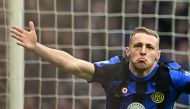 Inter Milan's Italian midfielder #16 Davide Frattesi celebrates after scoring his team's second goal during the Italian Serie A football match between Inter Milan and Hellas Verona at the Giuseppe-Meazza (San Siro) Stadium in Milan on January 6, 2024. (Photo by GABRIEL BOUYS / AFP)
