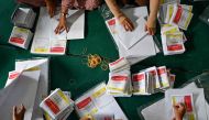 Workers prepare ballot papers in Banda Aceh on January 7, 2024, ahead of Indonesia's general election on February 14. (Photo by CHAIDEER MAHYUDDIN / AFP)
