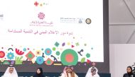 Chairman of the Scientific and Cultural Committee for Expo 2023 Doha Dr Mohammed Saif Al Kuwari (left) with panellists during the symposium at Expo 2023 Doha yesterday.