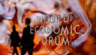 (Files) A photograph shows a sign of the World Economic Forum (WEF) at the Congress centre on the opening day of the World Economic Forum (WEF) annual meeting in Davos on January 16, 2023. (Photo by Fabrice Coffrini / AFP)