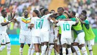 Senegal's players celebrates scoring their team's third goal during the Africa Cup of Nations (CAN) 2024 group C football match between Senegal and Gambia at Stade Charles Konan Banny in Yamoussoukro on January 15, 2024. (Photo by Issouf SANOGO / AFP)
