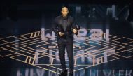 Thierry Henry on stage after collecting The Best FIFA Men's Player award on behalf of Lionel Messi during the Best FIFA Football Awards 2023. (Photo by Adrian Dennis / AFP)