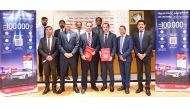 Officials from Lulu Hypermarket and badr Technology signing an agreement. 
