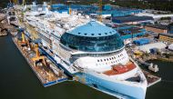 An aerial view taken on May 30, 2023 shows the construction site of the Royal Caribbean's new ship 'Icon of the Seas' at the Turku shipyard in Finland's southwest coast. Photos by Jonathan NACKSTRAND / AFP

