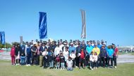 QFMA CEO Tamy Bin Ahmad Al Binali along with other officials and local community participates in National Sport Day.