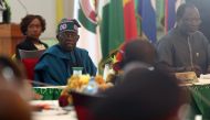 Nigeria's President and Chairman, Economic Community of West African States Commission (ECOWAS) Bola Tinubu, looks on during the extraordinary session of Economic Community of West African States (ECOWAS) Heads of State and Government in Abuja, Nigeria on February 24, 2024. (Photo by Kola Sulaimon / AFP)
