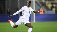 (FILES) France's midfielder Paul Pogba kicks the ball during the FIFA World Cup Qatar 2022 Group D qualification football match between Ukraine and France at the Olympic Stadium in Kiev on September 4, 2021. (Photo by FRANCK FIFE / AFP)
