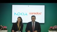 Ooredoo and Nokia officials at the signing of MoU at the Mobile World Congress in Barcelona