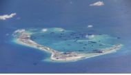 File photo: Chinese dredging vessels are purportedly seen in the waters around Mischief Reef in the disputed Spratly Islands in the South China Sea.