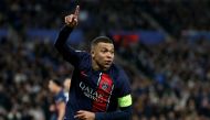 Paris Saint-Germain's French forward #07 Kylian Mbappe celebrates scoring his team's second goal during the UEFA Champions League last 16 second leg football match between Real Sociedad and Paris Saint-Germain (PSG) at the Anoeta stadium in San Sebastian on March 5, 2024. (Photo by FRANCK FIFE / AFP)
