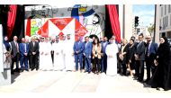 HSBC Qatar CEO Abdul Hakeem Mostafawi, Qatari artist Mubarak Al Malik with other officials marking 70th anniversary of HSBC, yesterday.