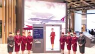Qatar Airways cabin crew at the airline's booth during ITB Berlin 2024 in Berlin. 