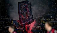 Inter Milan' supporters cheers during the Italian Serie A football match between Bologna and Inter Milan at the Renato-Dall'Ara stadium in Bologna on March 9, 2024. (Photo by Gabriel BOUYS / AFP)
