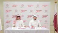  Director of EAA’s Al Fakhoora Programme Talal Al Hathal and Career Programs and Services Manager at QCDC Saad Al Kharji during the agreement signing ceremony.