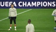 Paris Saint-Germain's Brazilian defender #05 Marquinhos (L) attends a training session on the eve of their UEFA Champions League last 16 second leg football match against Real Sociedad at the Reale Arena stadium in San Sebastian on March 4, 2024. (Photo by FRANCK FIFE / AFP)
