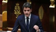 France's Prime Minister Gabriel Attal makes a statement about the situation in Ukraine prior to a debate at the National Assembly in Paris on March 12, 2024. (Photo by Thomas SAMSON / AFP)
