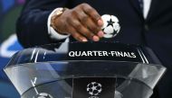 Former Nigerian footballer John Obi Mikel performs the 2023-2024 UEFA Champions League football tournament quarter-finals and semi-finals draw at the House of European Football in Nyon, on March 15, 2024. (Photo by Fabrice COFFRINI / AFP)

