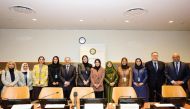 Minister of Social Development and Family H E Maryam bint Ali bin Nasser Al Misnad (sixth left), Qatar's Ambassador to UN H E Sheikha Alya Ahmed bin Saif Al Thani (sixth right) and others at the event.