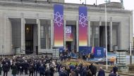 Attendees arrive for the International Atomic Energy Agency (IAEA) Nuclear Energy Summit at the Brussels Expo convention centre in Brussels on March 21, 2024. (Photo by Nicolas Maeterlinck / AFP)