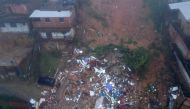 Aerial view showing rubble of houses destroyed due to heavy rains in Petropolis, Brazil, on March 23, 2024. (Photo by Florian PLAUCHEUR / AFP)
