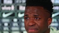 Brazil's forward Vinicius Junior cries as he gives a press conference on the eve of the international friendly football match between Spain and Brazil at the Ciudad Real Madrid training ground in Valdebebas, outskirts of Madrid, on March 25, 2024. (Photo by Pierre-Philippe MARCOU / AFP)
