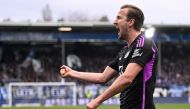 Bayern Munich's English forward #09 Harry Kane celebrates scoring during the German first division Bundesliga football match between SV Darmstadt 98 and FC Bayern Munich in Darmstadt, western Germany on March 16, 2024. (Photo by Kirill KUDRYAVTSEV / AFP)

