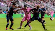 Luis Suarez of Inter Miami CF and Tayvon Gray of New York City FC compete for the ball during the second half at DRV PNK Stadium on March 30, 2024 in Fort Lauderdale, Florida. Rich Storry/Getty Images/AFP 
