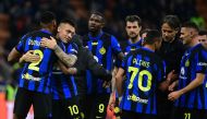 Inter Milan's players celebrate their 2-0 victory at the end of the Italian Serie A football match between Inter Milan and Empoli in Milan, on April 1, 2024. (Photo by Piero CRUCIATTI / AFP)
