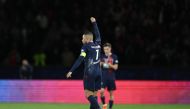Paris Saint-Germain's French forward #07 Kylian Mbappe celebrates his team's victory at the end of the French Cup (Coupe de France) semi final football match between Paris Saint-Germain (PSG) and Stade Rennais FC at the Parc des Princes stadium in Paris on April 3, 2024. (Photo by FRANCK FIFE / AFP)
