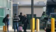 Picture released by API showing Mexico's Ambassador to Ecuador, Raquel Serur Smeke (R), leaving the country at the Mariscal Sucre International Airport in Quito on April 7, 2024. (Photo by Rolando ENRIQUEZ / API / AFP)
