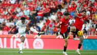 Real Madrid's French midfielder #18 Aurelien Tchouameni shots to score his team's first goal during the Spanish league football match between RCD Mallorca and Real Madrid CF at the Mallorca Son Moix stadium in Palma de Mallorca on April 13, 2024. (Photo by JAIME REINA / AFP)
