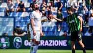 AC Milan's French forward #09 Olivier Giroud reacts at the end of the Italian Serie A football match between Unione Sportiva Sassuolo and AC Milan at the Mapei Stadium in Reggio Emilia, on April 14, 2024. (Photo by Piero CRUCIATTI / AFP)
