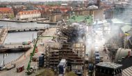 Work continues on the fire at the historic Boersen stock exchange building in central Copenhagen, Denmark on April 18, 2024. Photo by Ida Marie Odgaard / Ritzau Scanpix / AFP