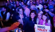 File photo: Republican presidential candidate, former UN Ambassador Nikki Haley poses for pictures with her supporters following a campaign rally on March 4, 2024 in Fort Worth, Texas. Emil Lippe/Getty Images/AFP

