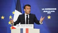 French President Emmanuel Macron delivers a speech on Europe in an amphitheatre of the Sorbonne University in Paris, on April 25, 2024. (Photo by Christophe Petit Tesson / POOL / AFP)