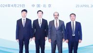 Minister of State for Energy Affairs, the President and CEO of QatarEnergy H E Saad Sherida Al Kaabi; Wang Yongxin, President of CMES; Li Maozhong, Chairman of Shandong Marine Energy; and Cong Jian, General Manager of CLNG pose for a group photo.