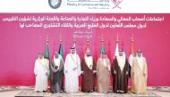 Minister of Commerce and Industry, H E Sheikh Mohammed bin Hamad bin Qassim Al Thani pose for a group photo with dignitaries during the meeting.