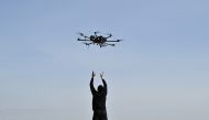 File photo of a pilot practicing with a drone on a training ground in Kyiv region on February 29, 2024. (Photo by Genya SAVILOV / AFP)