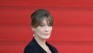 (FILES) French-Italian model and singer Carla Bruni-Sarkozy arrives to attend a church service for former French President Jacques Chirac at the Saint-Sulpice church in Paris on September 30, 2019. Photo by Eric Feferberg / AFP.