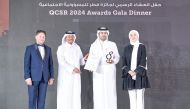 Ooredoo officials along with others during the CSR Awards ceremony. 